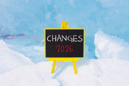 Changes 2026 symbol. Concept words Changes 2026 on blackboard. Beautiful blue lake Baikal ice background. Business and changes 2026 concept. Copy space.の写真素材