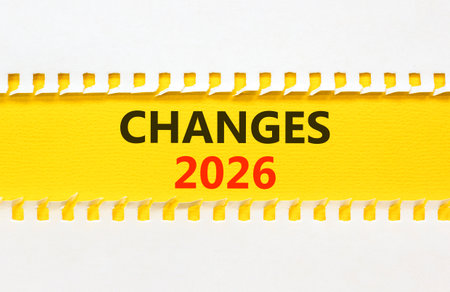 Changes 2026 symbol. Concept words Changes 2026 on beautiful yellow paper. Beautiful white paper background. Business and changes 2026 concept. Copy space.の写真素材