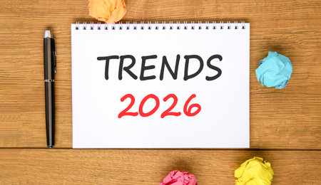 Trends 2026 new year symbol. Concept words Trends 2026 on beautiful white note. Beautiful wooden...