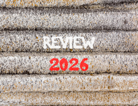 Review 2026 symbol. Concept words Review 2026 on beautiful gray mountain wall. Beautiful gray mountain wall background. Business and review 2026 concept. Copy space.の写真素材