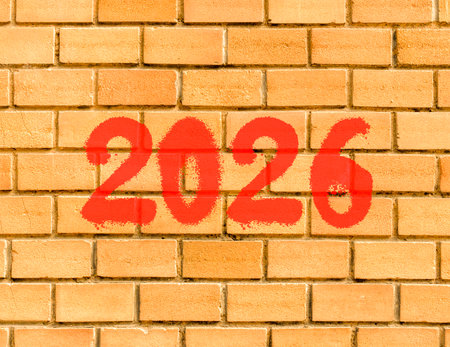 Business concept of 2026 new year symbol. Concept number 2026 Happy new year on beautiful brown brick wall. Beautiful brown brick wall background. Business 2026 happy new year concept. Copy space.の写真素材