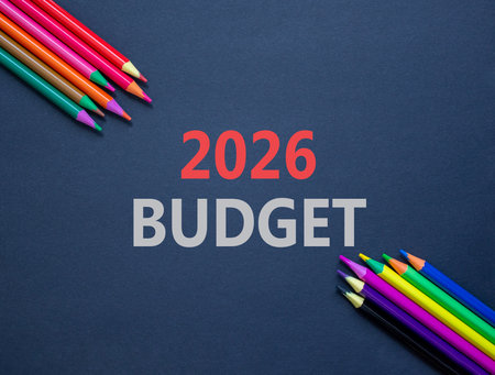 2026 Budget symbol. Concept words 2026 Budget on beautiful black paper. Beautiful black paper background. Beautiful colored pencils. Business and 2026 budget concept. Copy space.の写真素材