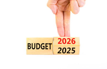 2026 Budget symbol. Concept words 2026 Budget on beautiful wooden blocks. Beautiful white paper background. Businessman's hand. Business and 2026 budget concept. Copy space.の写真素材