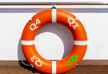 2nd second quarter symbol. Beautiful orange lifebuoy with words Q2 Q3 . Beautiful white background....