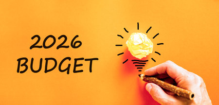 2026 Budget symbol. Concept words 2026 Budget on beautiful orange paper. Beautiful orange paper...