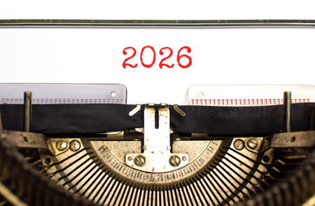 Business concept of 2026 new year symbol. Concept number 2026 Happy new year typed on beautiful old retro typewriter. Beautiful white background. Business 2026 happy new year concept. Copy space.の写真素材