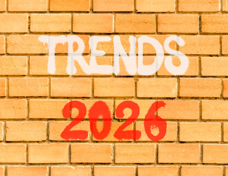 Trends 2026 new year symbol. Concept words Trends 2026 on beautiful old brown brick wall. Beautiful old brown brick wall background. Business and Trends 2026 new year concept. Copy space.の写真素材