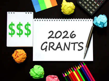 2026 Grants symbol. Concept words 2026 Grants on beautiful white note. Beautiful black paper...
