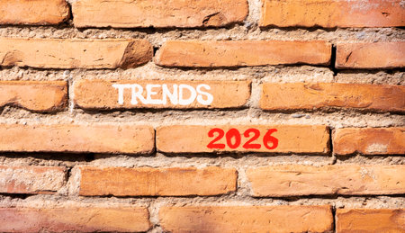Trends 2026 new year symbol. Concept words Trends 2026 on beautiful brown brick wall. Beautiful brown brick wall background. Business and Trends 2026 new year concept. Copy space.の写真素材
