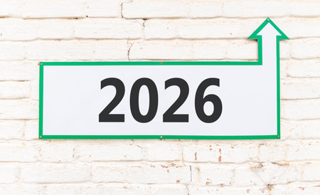 Business concept of 2026 new year symbol. Concept number 2026 Happy new year on beautiful white road sign. Beautiful old white brick wall background. Business 2026 happy new year concept. Copy space.の写真素材
