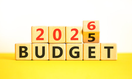 2026 Budget symbol. Concept words 2026 Budget on beautiful wooden blocks. Beautiful white and yellow...