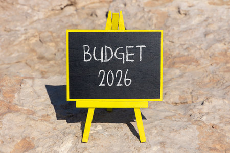Budget 2026 symbol. Concept words Budget 2026 on beautiful black blackboard. Beautiful stone background. Business and budget 2026 concept. Copy space.の写真素材