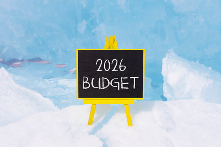 2026 Budget symbol. Concept words 2026 Budget on beautiful black blackboard. Beautiful blue lake Baikal ice background. Business and 2026 budget concept. Copy space.の写真素材
