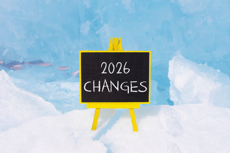 2026 Changes symbol. Concept words 2026 Changes on beautiful black board. Beautiful blue lake Baikal ice background. Business and 2026 changes concept. Copy space.の写真素材