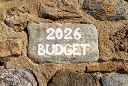 2026 Budget symbol. Concept words 2026 Budget on beautiful gray stone on stone wall. Beautiful stone wall background. Business and 2026 budget concept. Copy space.の写真素材