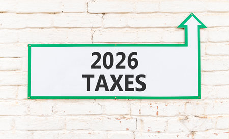 2026 taxes new year symbol. Concept words 2026 taxes on beautiful white sign with arrow. Beautiful...