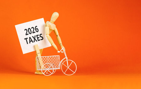 2026 taxes new year symbol. Concept words 2026 taxes on beautiful white card. Beautiful orange paper...