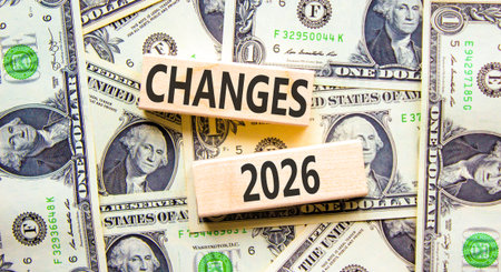 Changes 2026 symbol. Concept words Changes 2026 on beautiful wooden blocks. Beautiful dollar bills...