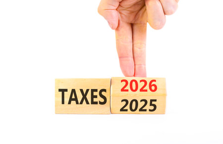 2026 taxes new year symbol. Concept words 2026 taxes on beautiful wooden blocks. Beautiful white...