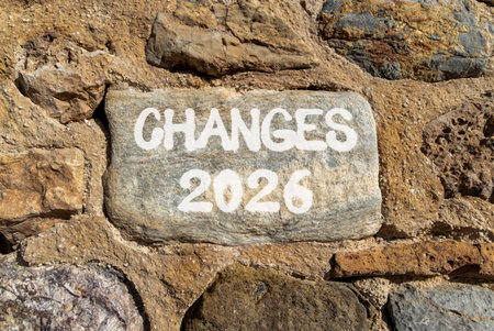 Changes 2026 symbol. Concept words Changes 2026 on beautiful gray stone on stone wall. Beautiful stone wall background. Business and changes 2026 concept. Copy space.の写真素材