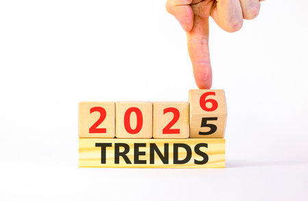 2026 Trends symbol. Concept words 2026 Trends on beautiful wooden blocks. Beautiful white paper...