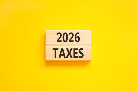 2026 taxes new year symbol. Concept words 2026 taxes on beautiful wooden blocks. Beautiful yellow...