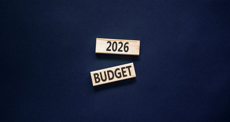2026 Budget symbol. Concept words 2026 Budget on beautiful wooden blocks. Beautiful black paper background. Business and 2026 budget concept. Copy space.の写真素材