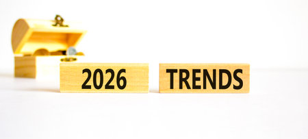 2026 Trends symbol. Concept words 2026 Trends on beautiful wooden blocks. Beautiful white paper...