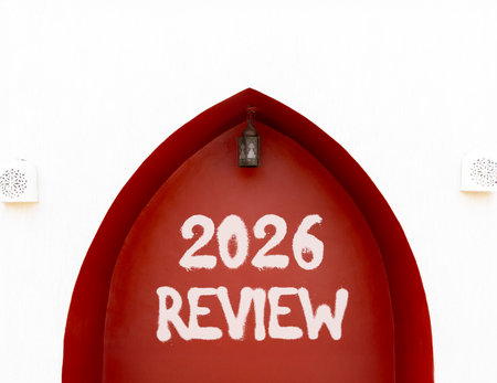 2026 Review symbol. Concept words 2026 Review on beautiful white and red wall. Beautiful white and...