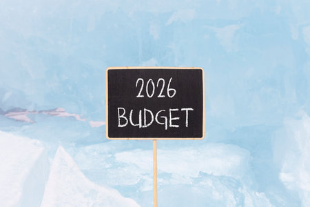 2026 Budget symbol. Concept words 2026 Budget on beautiful black blackboard. Beautiful blue lake...
