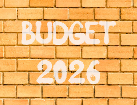 Budget 2026 symbol. Concept words Budget 2026 on beautiful old brown brick wall. Beautiful old brown brick wall background. Business and budget 2026 concept. Copy space.の写真素材