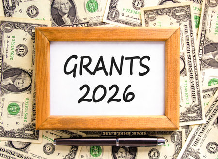 Grants 2026 symbol. Concept words Grants 2026 on beautiful wooden picture frame. Beautiful dollar...