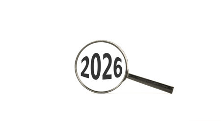 Business concept of 2026 new year symbol. Concept number 2026 Happy new year in black magnifying glass. Beautiful white background. Business 2026 happy new year concept. Copy space.の写真素材