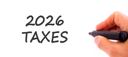 2026 taxes new year symbol. Concept words 2026 taxes on beautiful white paper. Beautiful white paper...