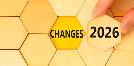 Changes 2026 symbol. Concept words Changes 2026 on beautiful wooden puzzles. Beautiful wooden...