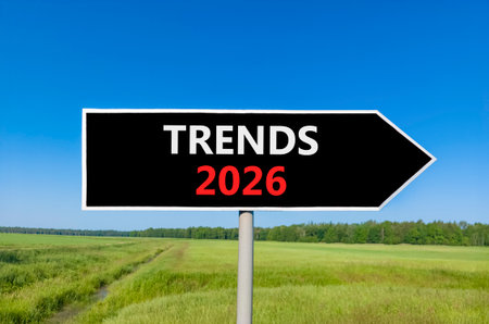 Trends 2026 new year symbol. Concept words Trends 2026 on beautiful black road sign. Beautiful green...