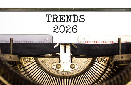 Trends 2026 new year symbol. Concept words Trends 2026 typed on beautiful old retro typewriter. Beautiful white background. Beautiful old typewriter. Business Trends 2026 new year concept. Copy space.の写真素材