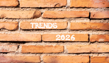 Trends 2026 new year symbol. Concept words Trends 2026 on beautiful brown brick wall. Beautiful brown brick wall background. Business and Trends 2026 new year concept. Copy space.の写真素材