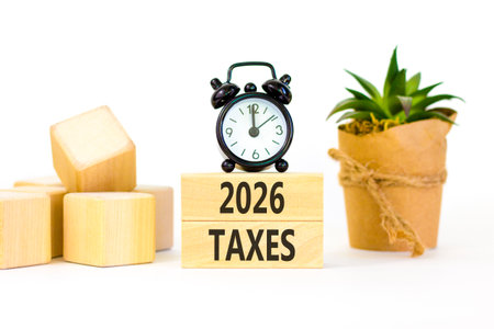 2026 taxes new year symbol. Concept words 2026 taxes on beautiful wooden blocks. Beautiful white...