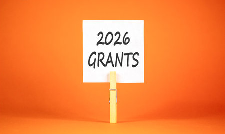 2026 Grants symbol. Concept words 2026 Grants on beautiful white paper on wooden clothespin....