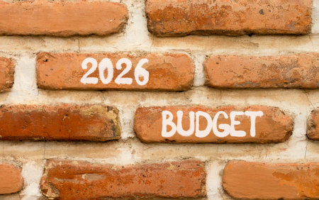 2026 Budget symbol. Concept words 2026 Budget on beautiful brown brick wall. Beautiful brown brick wall background. Business and 2026 budget concept. Copy space.の写真素材