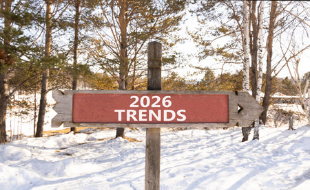 2026 Trends new year symbol. Concept words 2026 Trends on beautiful wooden road sign. Beautiful winter forest background. Business and 2026 Trends new year concept. Copy space.の写真素材