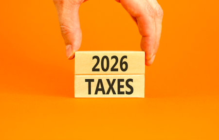 2026 taxes new year symbol. Concept words 2026 taxes on beautiful wooden blocks. Beautiful orange...
