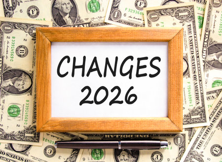 Changes 2026 symbol. Concept words Changes 2026 on beautiful wooden picture frame. Beautiful dollar...