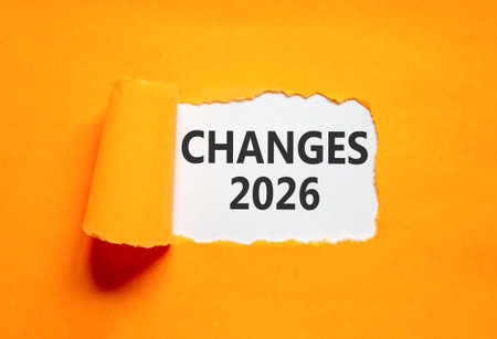Changes 2026 symbol. Concept words Changes 2026 on beautiful white paper. Beautiful orange paper...