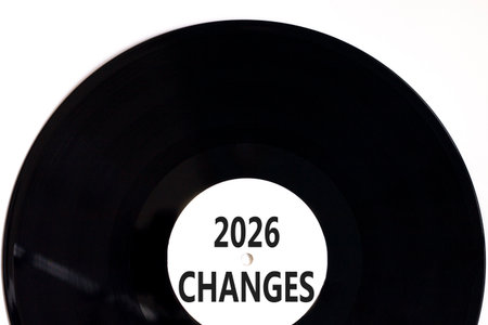 2026 Changes symbol. Concept words 2026 Changes on beautiful white and black vinyl disk. Beautiful white paper background. Business and 2026 changes concept. Copy space.の写真素材