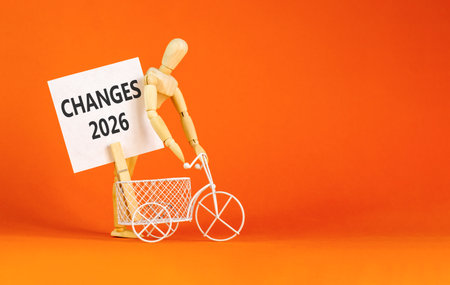 Changes 2026 symbol. Concept words Changes 2026 on beautiful white card. Beautiful orange paper...