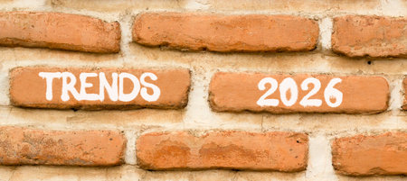 Trends 2026 new year symbol. Concept words Trends 2026 on beautiful brown brick wall. Beautiful brown brick wall background. Business and Trends 2026 new year concept. Copy space.の写真素材