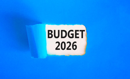 Budget 2026 symbol. Concept words Budget 2026 on beautiful white paper. Beautiful blue paper background. Business and budget 2026 concept. Copy space.の写真素材