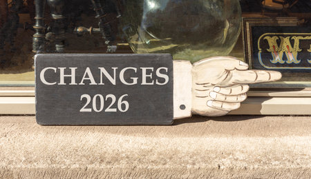 Changes 2026 symbol. Concept words Changes 2026 on beautiful black wooden hand sign. Beautiful shop...